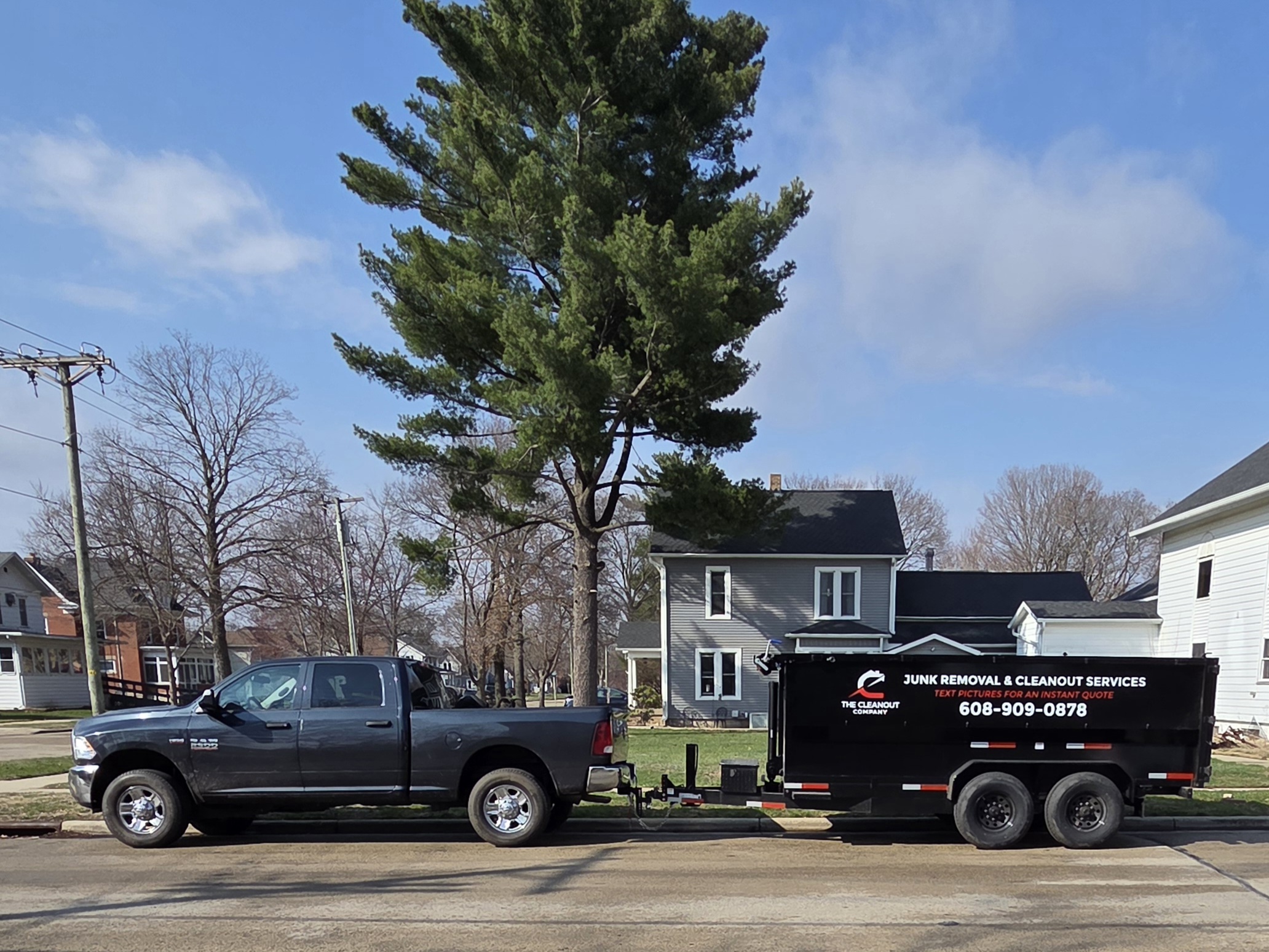 The Cleanout Company truck and trailer ready for service