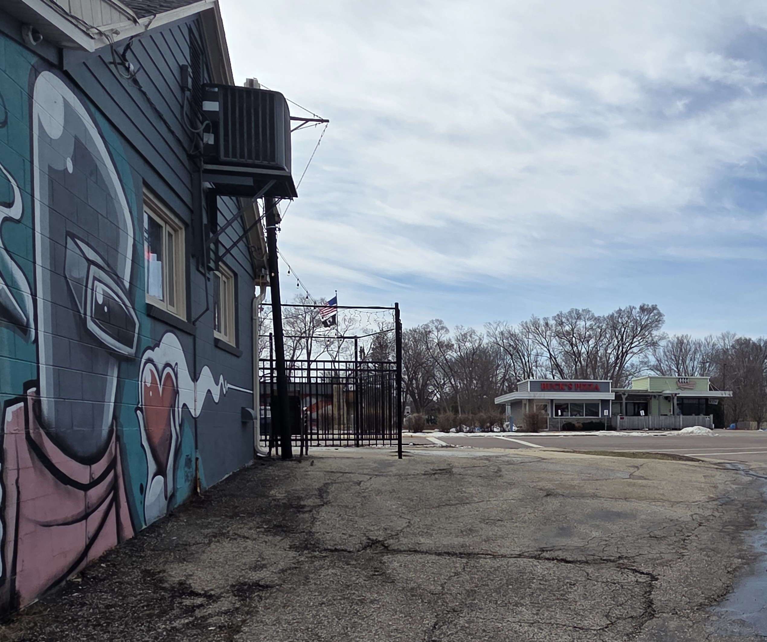 Junk removal service in Monona, WI — Creative downtown lakeside community with street art