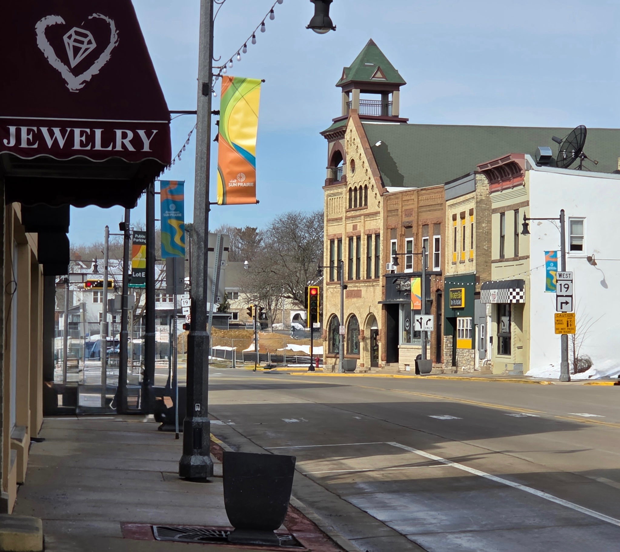 Junk removal service in Sun Prairie, WI — Historic downtown main street with courthouse building